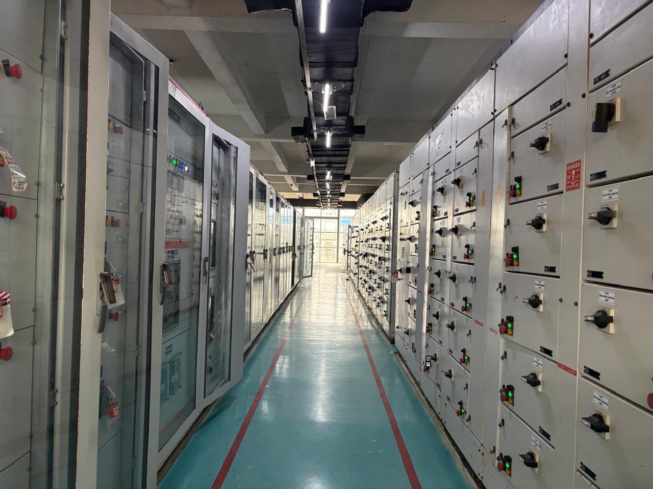 Open control panel showing wiring and terminals